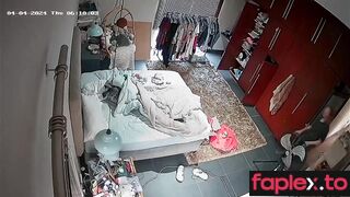 German blonde girl gets dressed in her room