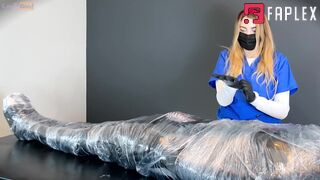 A Mummified Patient Is Milked In A Chastity Belt By Nurse Kitty